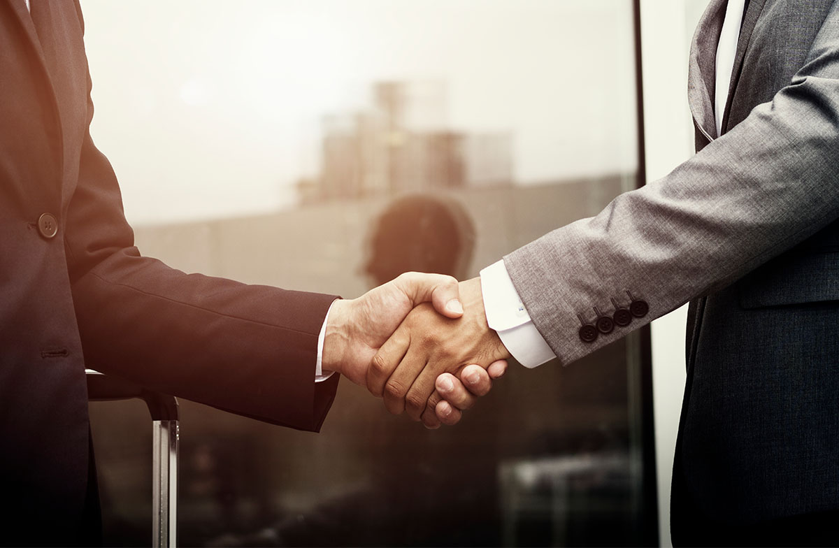 corporate-businessmen-shaking-hands2